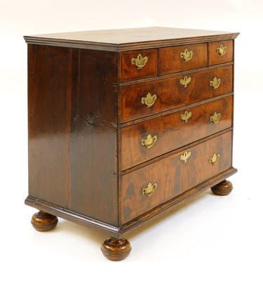 Lot 116 - A William and Mary walnut and oak chest of drawers