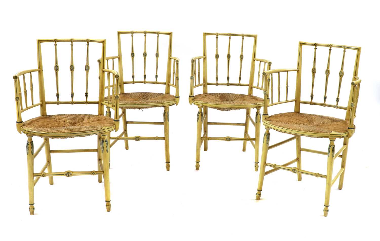 Lot 218 - A set of four painted Regency-style elbow chairs