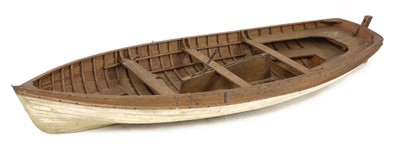 Lot 675 - A wooden model rowing boat