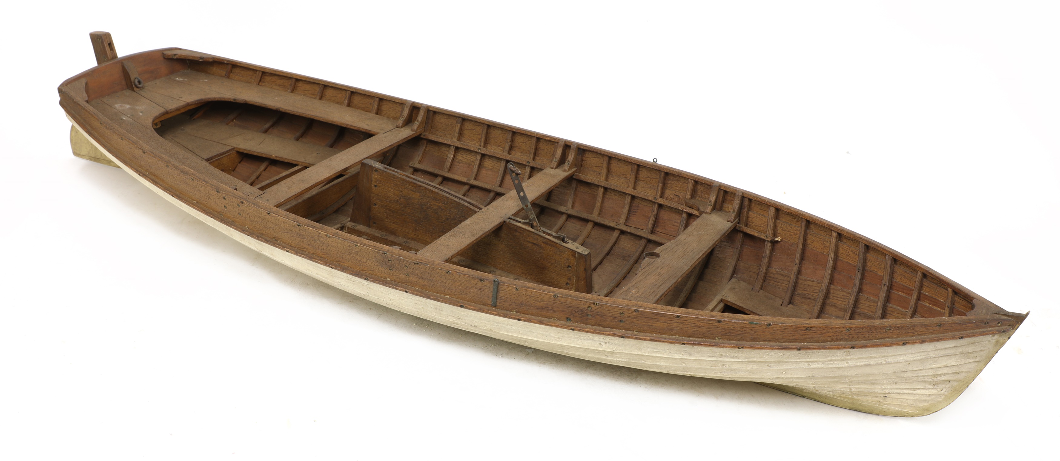 Lot 675 - A wooden model rowing boat,