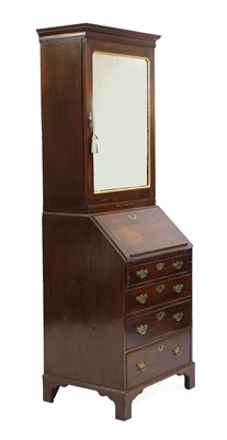Lot 325 - A diminutive George II-style mahogany and parcel-gilt bureau bookcase