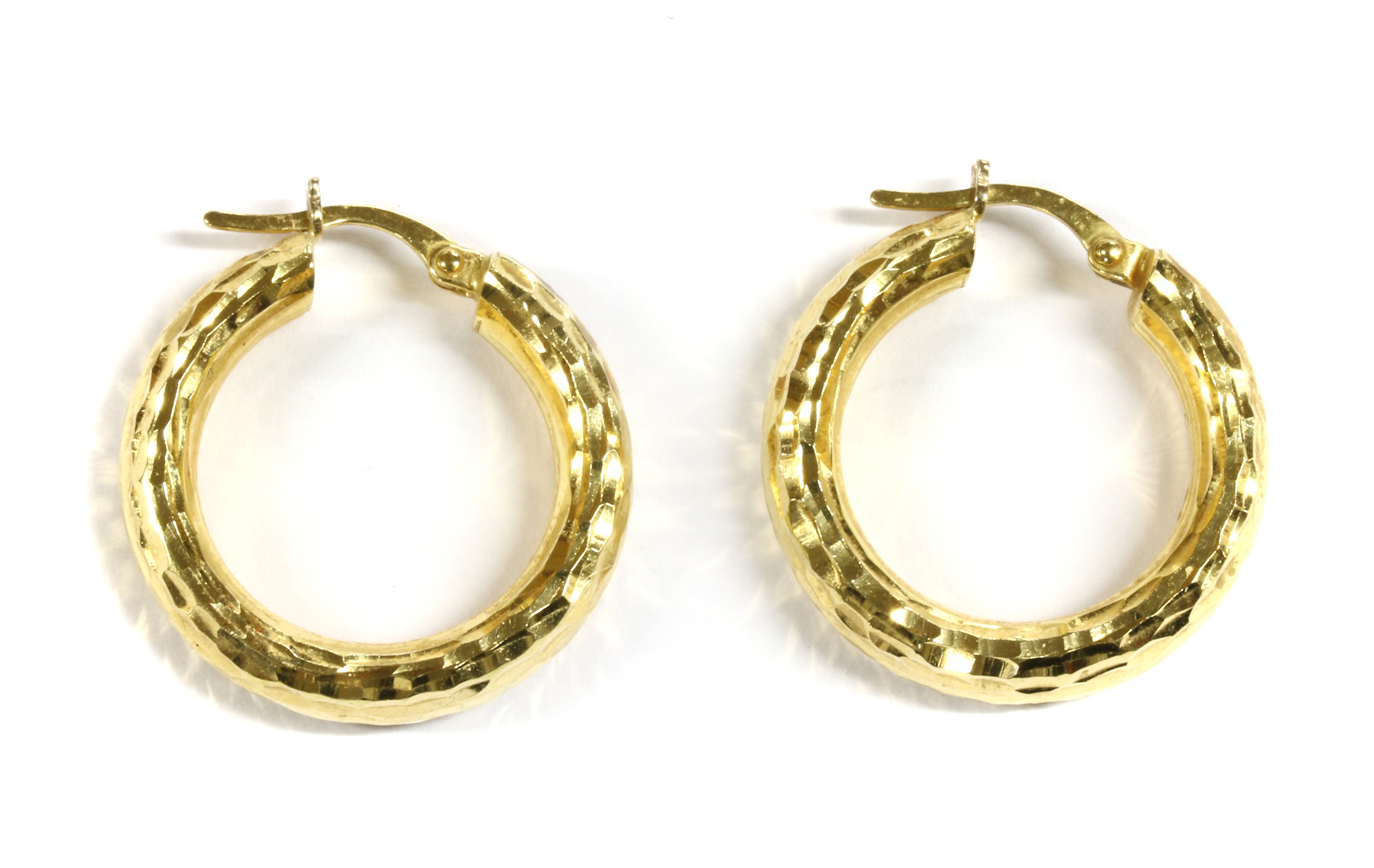Lot 81 A pair of Italian gold hoop earrings,