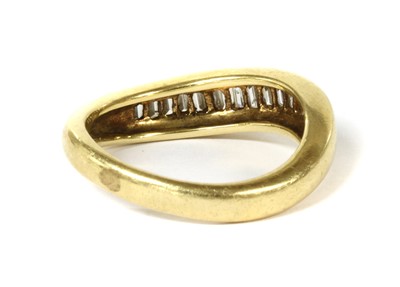 Lot 126 - An 18ct gold diamond half eternity ring