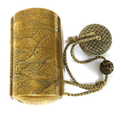 Lot 209 - A Japanese gilt lacquered inro