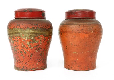 Lot 98 - A pair of pottery tobacco jars
