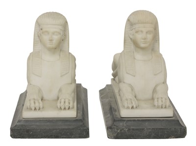 Lot 860 - A pair of carved marble sphinx