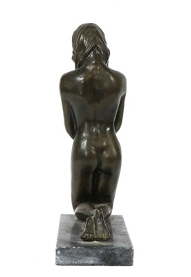 Lot 93 - A bronze kneeling nude