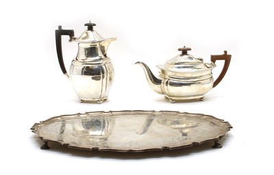 Lot 57 - A composed silver three-piece tea service