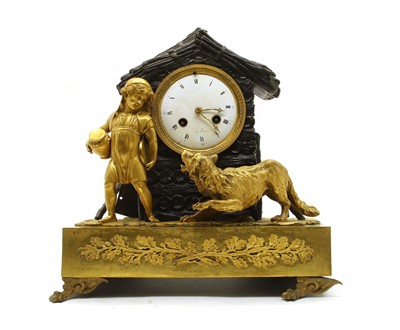 Lot 271 - A composed gilt bronze clock garniture