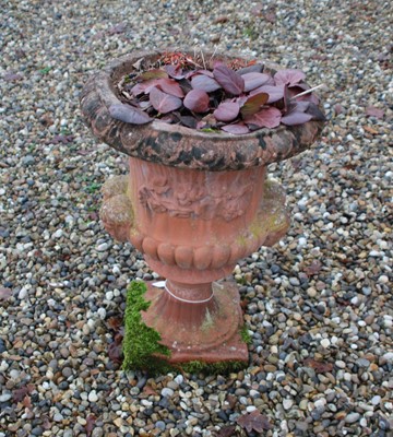 Lot 412 - Faux terracotta garden urn