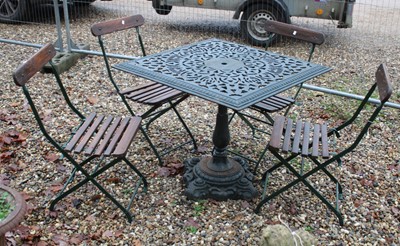 Lot 414 - A set of four Edwardian folding garden chairs