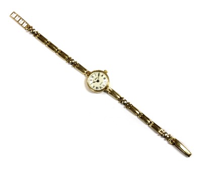 Lot 265 - A ladies' 9ct gold quartz bracelet watch