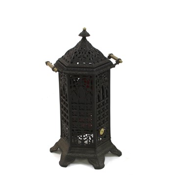 Lot 581 - A vintage cast iron ‘Cathedral’ stove