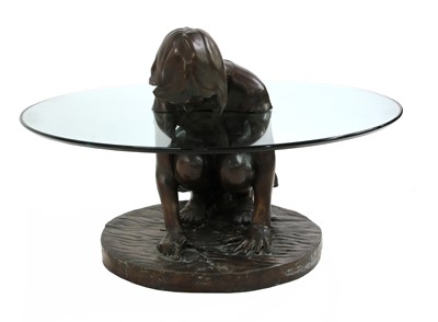 Lot 594 - A contemporary bronze and glass 'She'll Find' coffee table