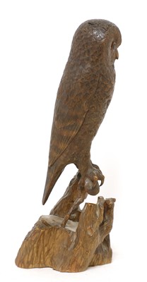 Lot 72 - A Black Forest carved softwood owl