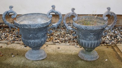 Lot 406 - A pair of lead garden urns