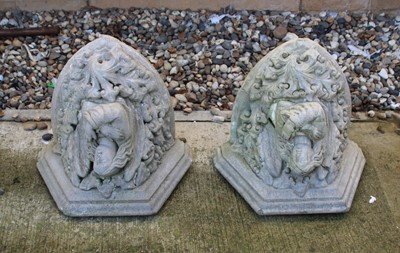 Lot 407 - A pair of composition stone wall brackets