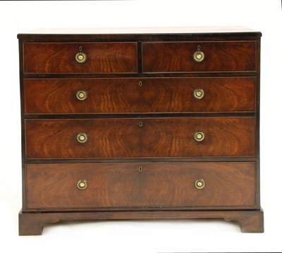 Lot 606 - A mahogany chest of two short and three long drawers