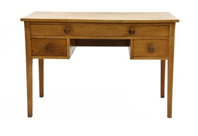 Lot 103 - An oak desk