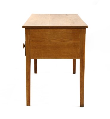Lot 103 - An oak desk