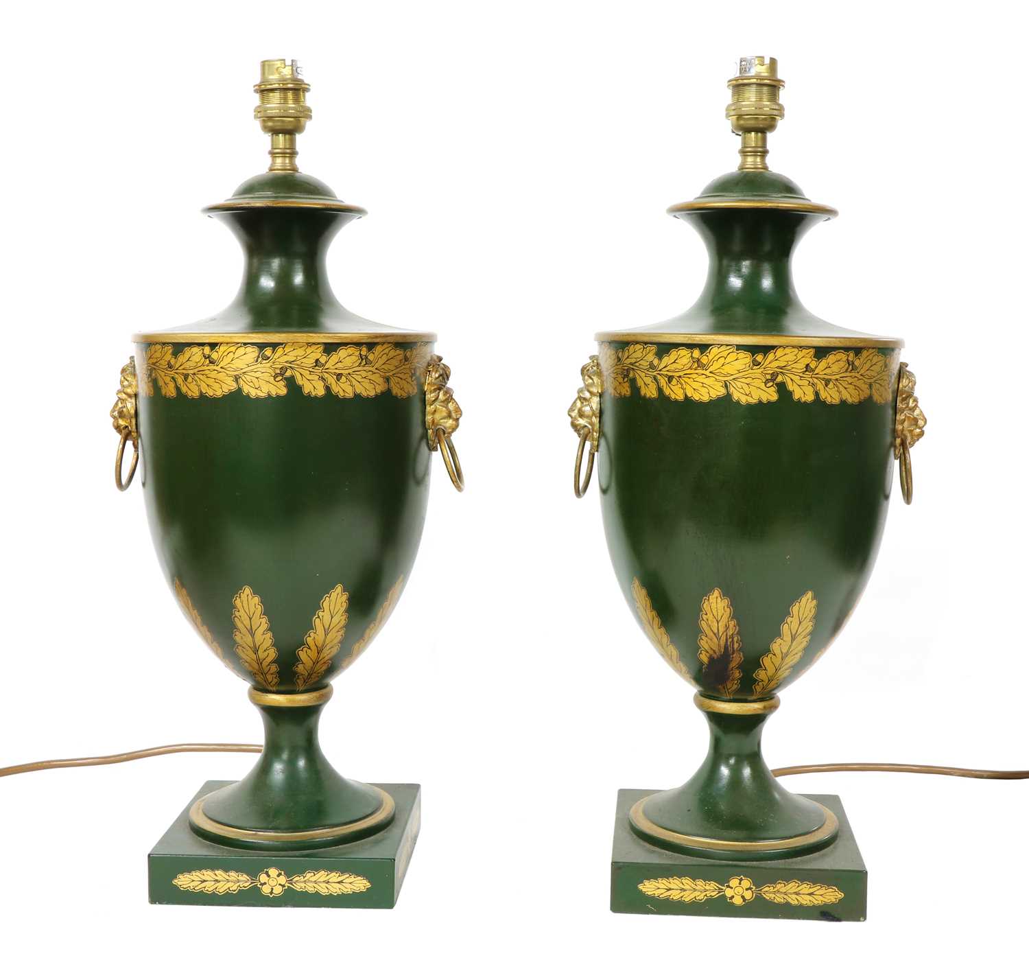 Lot 105 - A pair of Toleware table lamps