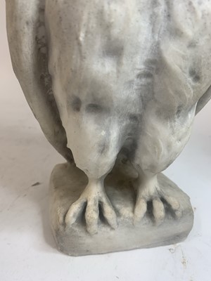 Lot 324 - A pair of carved marble owls