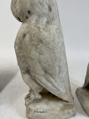 Lot 324 - A pair of carved marble owls