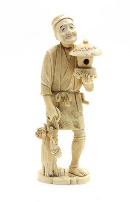 Lot 256 - A 19th century Japanese carved sectional ivory figure of a gardener