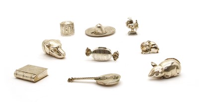 Lot 105 - A collection of miniature novelty silver items