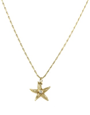 Lot 134 - A gold diamond set starfish pendant