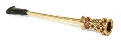 Lot 246 - A Dunhill gold cased ruby set cigarette holder