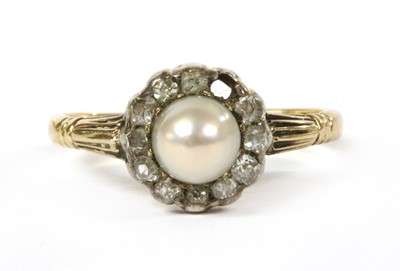 Lot 29 - A gold pearl and diamond cluster ring