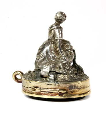 Lot 243 - An erotic hinged silver bloodstone seal