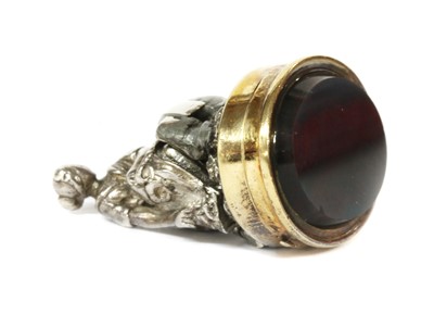 Lot 243 - An erotic hinged silver bloodstone seal