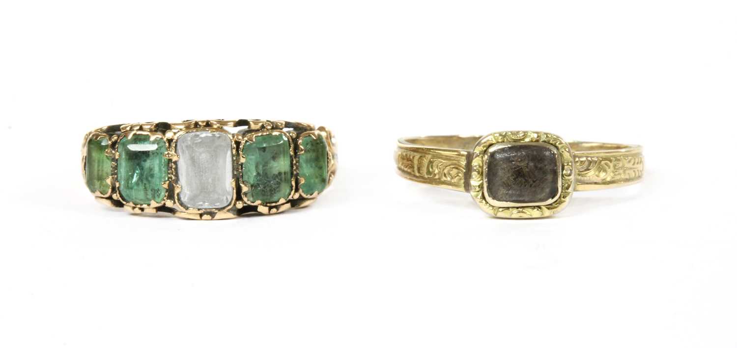 Lot 18 - A Victorian gold white gemstone and emerald ring