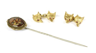 Lot 238 - A pair of 9ct gold fox head cufflinks, by Cropp & Farr