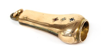 Lot 245 - A gold cased gem set cigar cutter