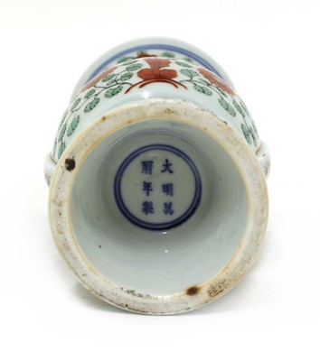 Lot 48 - A Chinese polychrome-decorated gu vase