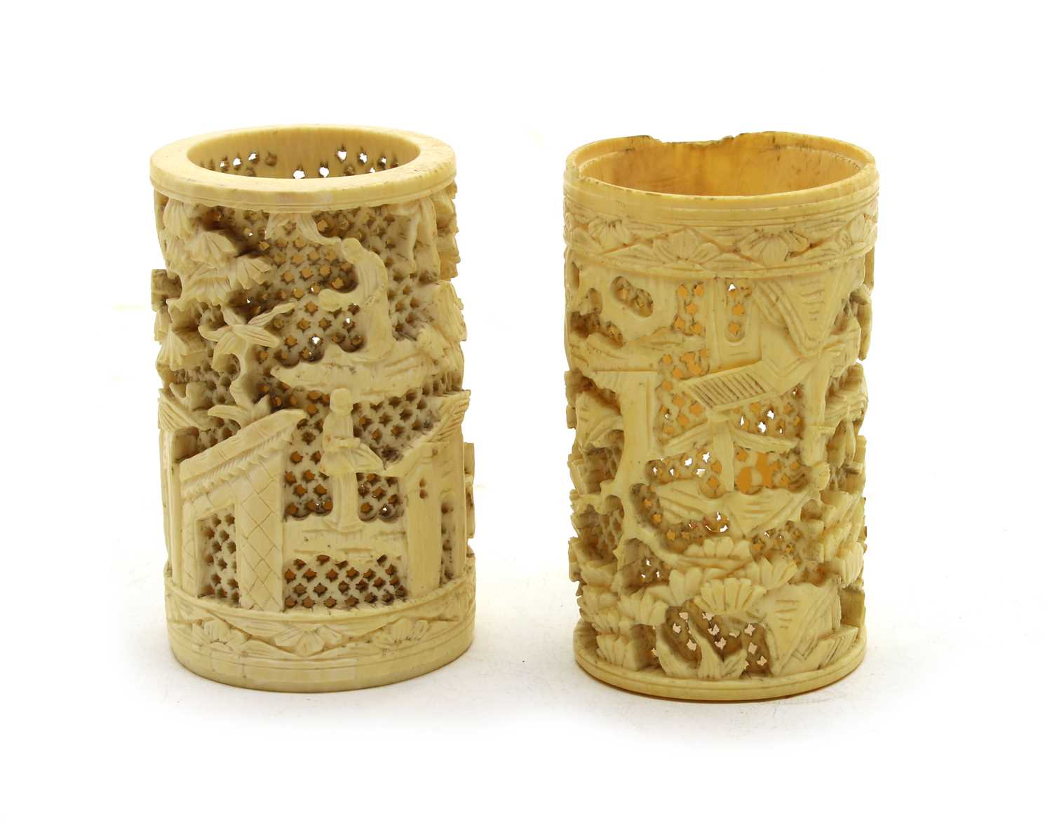 Lot 116 - A pair of early 20th century Japanese ivory cylindrical brush holders