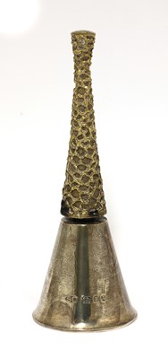Lot 405 - A silver gilt table bell