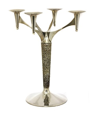 Lot 409 - A silver-gilt four branch candelabra