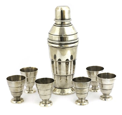 Lot 142 - An Art Deco silver-plated cocktail shaker and six beakers