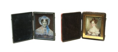 Lot 369 - A Victorian cased portrait miniature of a young woman with tied up curly hair