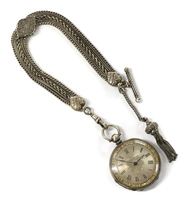 Lot 254 - A silver key wound open-faced fob watch