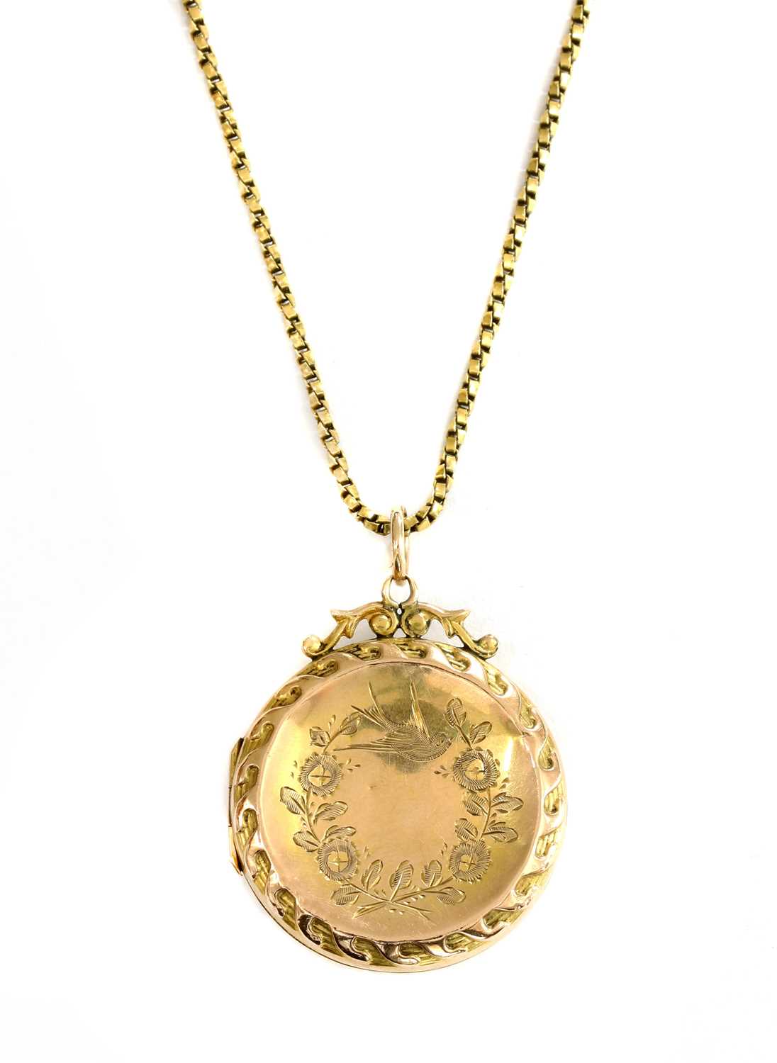 Lot 5 - A 9ct back and front locket