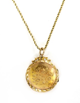 Lot 5 - A 9ct back and front locket