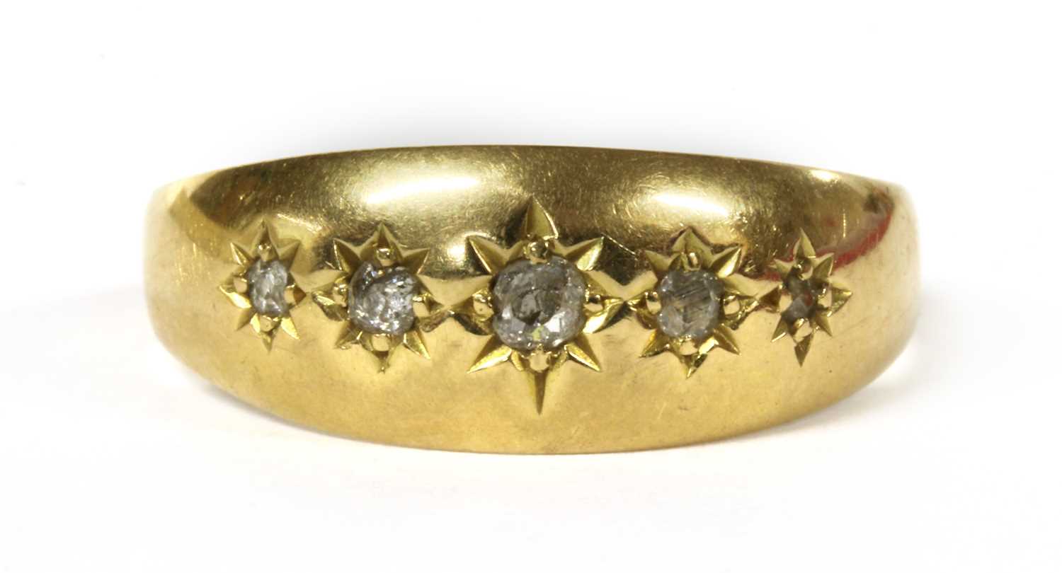 Lot 7 - An 18ct gold five stone diamond ring