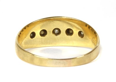 Lot 7 - An 18ct gold five stone diamond ring