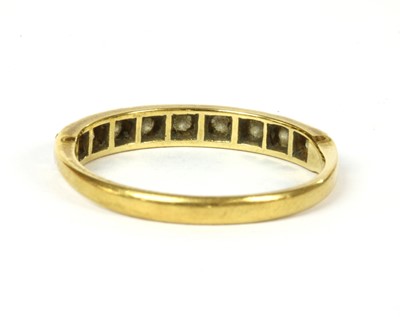 Lot 127 - An 18ct gold diamond half eternity ring