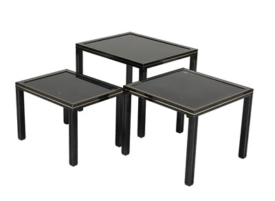 Lot 330 - A nest of three lacquered tables